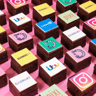 Corporate Brownies with Edible Logos featuring rich chocolate squares topped with detailed branded prints by Crumbs & Doilies